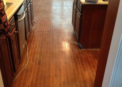 a hardwood floor before refinishing